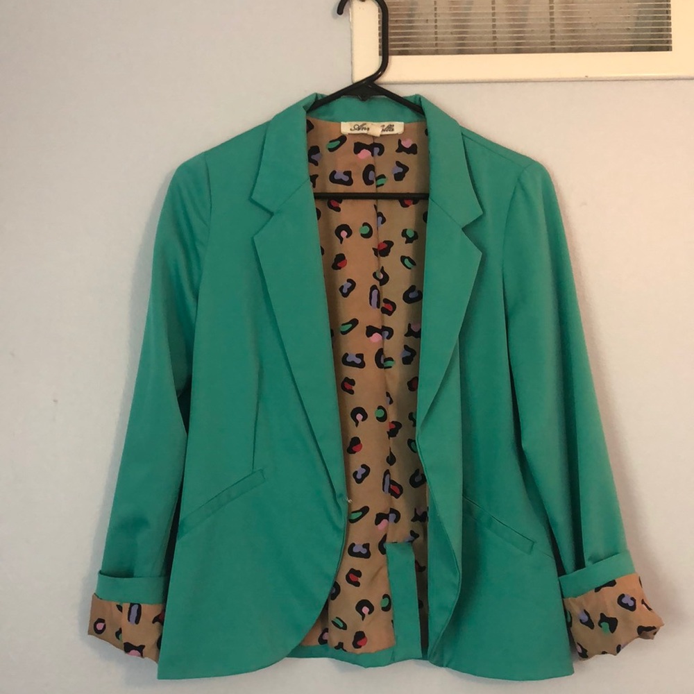 Teal blazer with cheetah interior